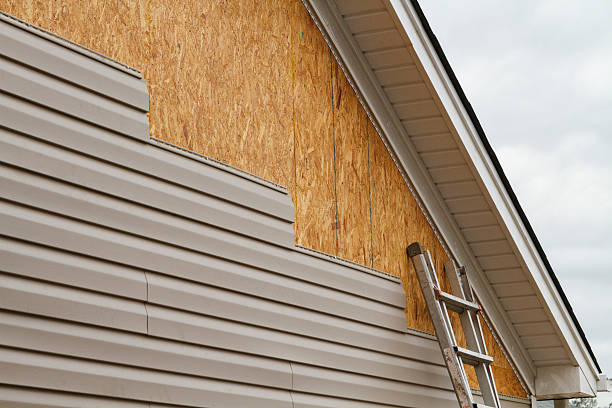 Professional Emergency Siding Repair technician working in Jeannette, PA
